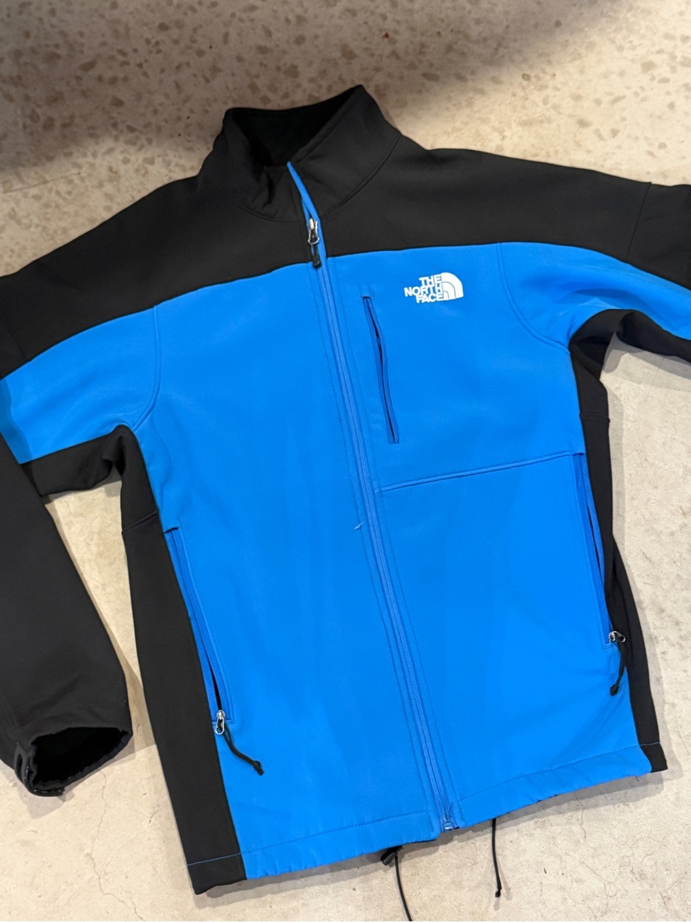 The North Face Blue and Black Softshell Jacket